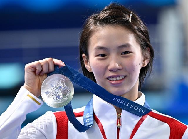 皇冠体育-陈芋汐再获银牌 从预赛到半决赛再到决赛愈发坚定